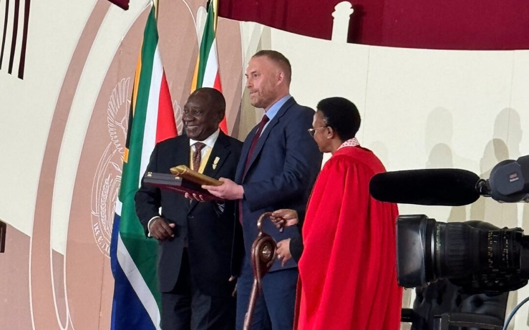 Matthew Stadlen receives the Companion of OR Tambo from President Ramaphosa on behalf of his late father Sir Nicholas Stadlen